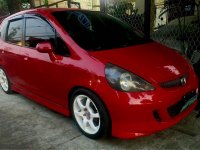 Selling Red Honda Fit 2001 in Quezon