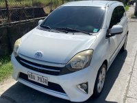 Selling White Toyota Wigo 2016 in Makati