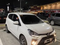 Selling White Toyota Wigo 2021 in Manila