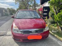 Red Kia Carnival 2007 for sale