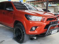 Selling Orange Toyota Hilux 2017 in San Juan