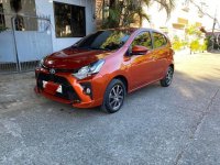 Sell Orange 2020 Toyota Wigo in Quezon City