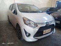 Selling White Toyota Wigo 2019 in Quezon