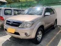 Pearl White Toyota Fortuner 2006 for sale in Balete 