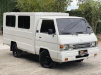 Selling White Mitsubishi L300 2018 in Quezon City