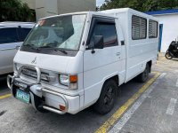 Selling White Mitsubishi L300 2011 in Los Baños
