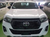 Selling White 2019 Toyota Hilux in Quezon City