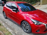 Selling Red Mazda 2 2015 in Quezon