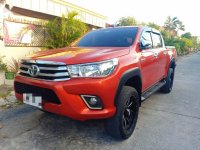 Orange Toyota Hilux 2017 for sale in Angeles 