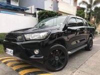 Black Toyota Hilux 2016 for sale in Angeles 
