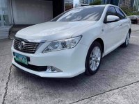 Sell Pearl White 2014 Toyota Camry in Rodriguez