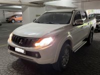 Sell White 2015 Mitsubishi Strada in San Juan