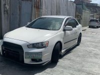 White Mitsubishi Lancer 2010 for sale in Quezon City