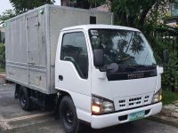 Purple Isuzu Nhr 2013 for sale in Manual