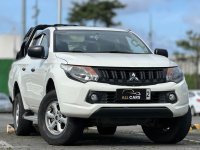 Selling White Mitsubishi Strada 2017 in Makati