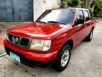 Sell Bronze 2009 Nissan Frontier in Quezon City