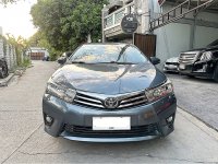 Selling White Toyota Altis 2015 in Bacoor