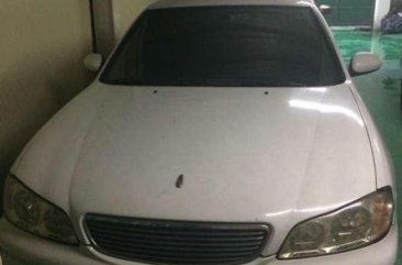 For sale white Nissan Cefiro brougham