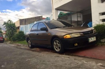 Mazda 323 Rayban Gen 2.5 MT Brown For Sale 