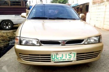 Mitsubishi Lancer GLXI 1995 AT Golden For Sale 