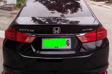 Well-maintained Honda City E CVT 2014 for sale