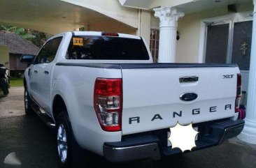 2013 Mitsubishi Strada glxv AT & 2015 Ford Ranger xlt MT