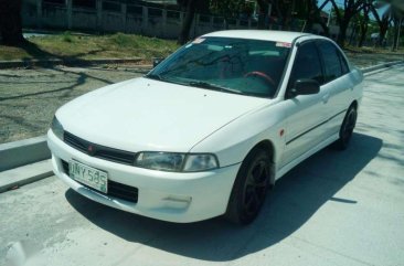 Mitsubishi Lancer GlXi MXLooked mags 1997model