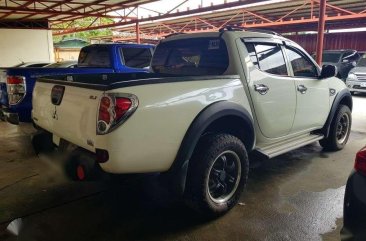 2010 MITSUBISHI STRADA GLX Manual Transmission White for sale