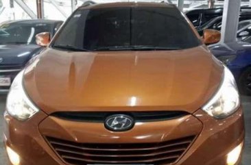 Hyundai Tucson 2014 Manual Gas Orange For Sale 