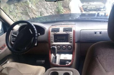 Kia Carnival AT White Well Maintained For Sale 