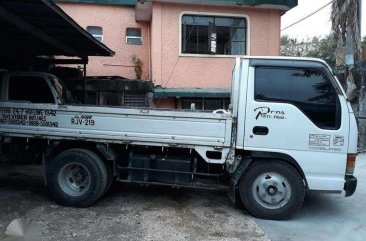 ISUZU ELF 4HF1 10ft Drop Side for sale