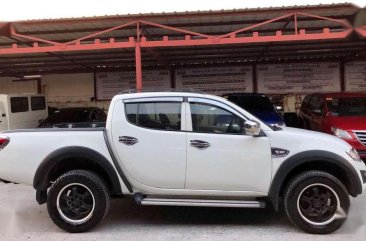 2010 MITSUBISHI STRADA GLX Manual Transmission White for sale