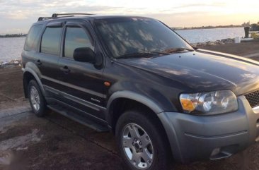 Ford Escape 4x2 XLT Black 2006 acquired low mileage 250k negotiable