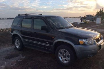 Ford Escape 4x2 XLT Black 2006 acquired low mileage 250k negotiable