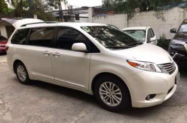 2015 Toyota Sienna XLE White on beige leather. 