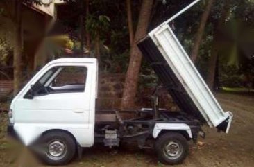 Multicab Suzuki 4x4 gas mini dump.