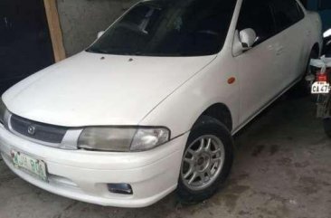 Mazda 323 1999 model first owner  for sale  ​fully loaded