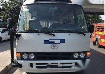 Toyota Coaster 2015  30 seater White For Sale 