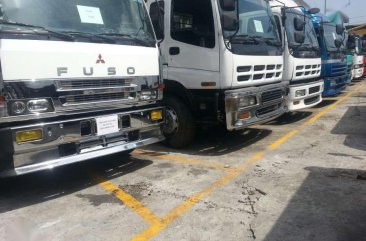 For sale Isuzu Elf dropside for sale 890T 4he1 engine turbo aircon