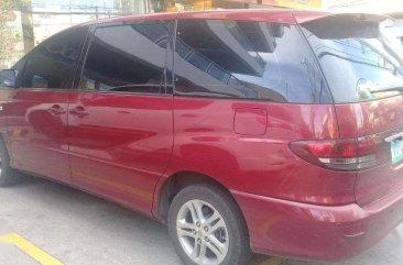 Automatic Transmission Red 2005 Toyota Previa with 150k km