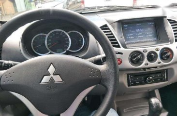 Mitsubishi Strada 2014 GLX 2.5 4x2 MT Black For Sale 