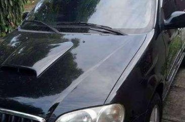 kia grand carnival 2002 blackvan for sale 