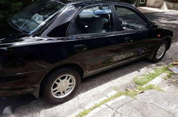 Mazda 323 Familia 1996  Black For Sale 