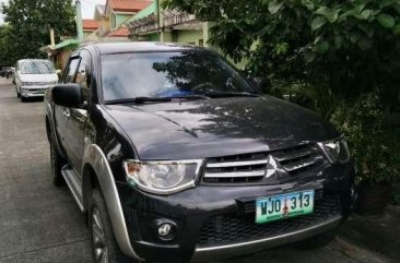 For sale 2012 Mitsubishi Strada 4x4 automatic.