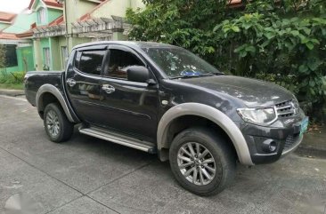 For sale 2012 Mitsubishi Strada 4x4 automatic.