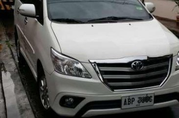 Toyota Innova G 2015 model pearl white. 