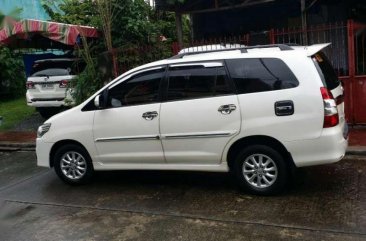 Toyota Innova G 2015 model pearl white. 