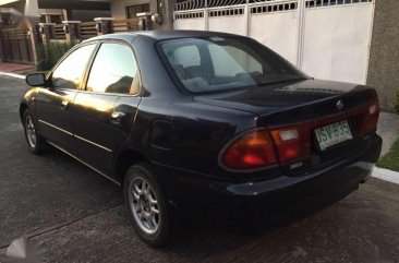 Mazda Familia 1997 Dohc efi engine 1.6 ( fuel efficient )