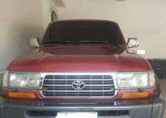SELLING red 1997 Toyota Land Cruiser 80