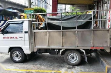 2010 Mitsubishi L300 stake body for sale 